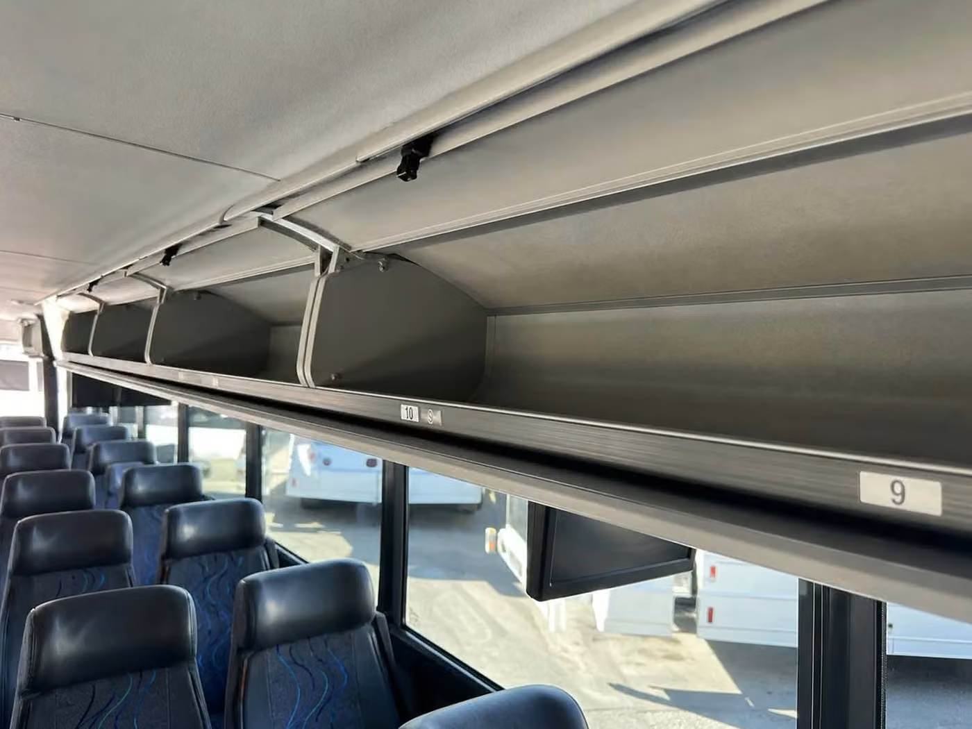 beverly hills 28 passenger minibus overhead storage