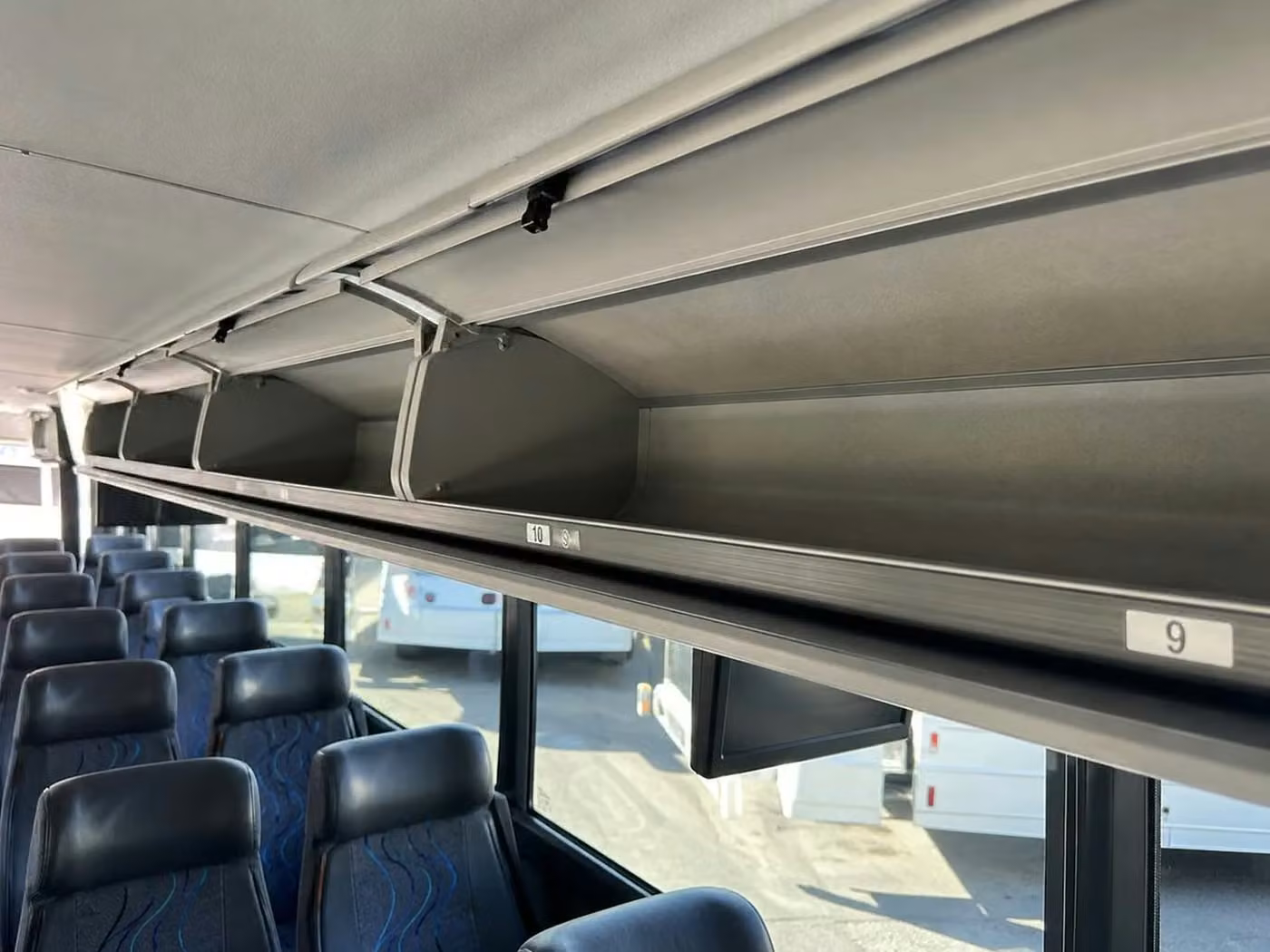 beverly hills 56 passenger charter bus overhead storage