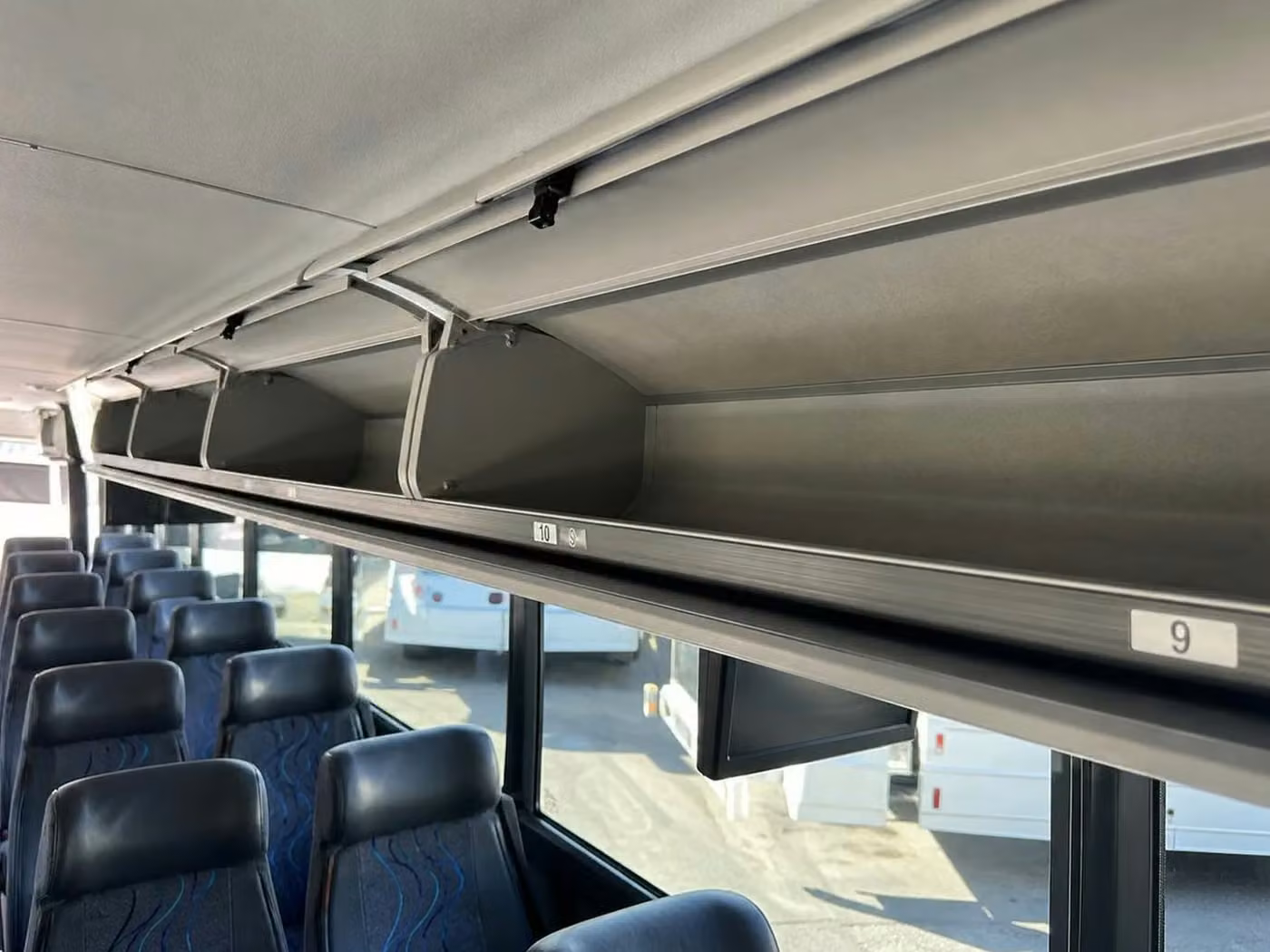 beverly hills charter bus overhead storage